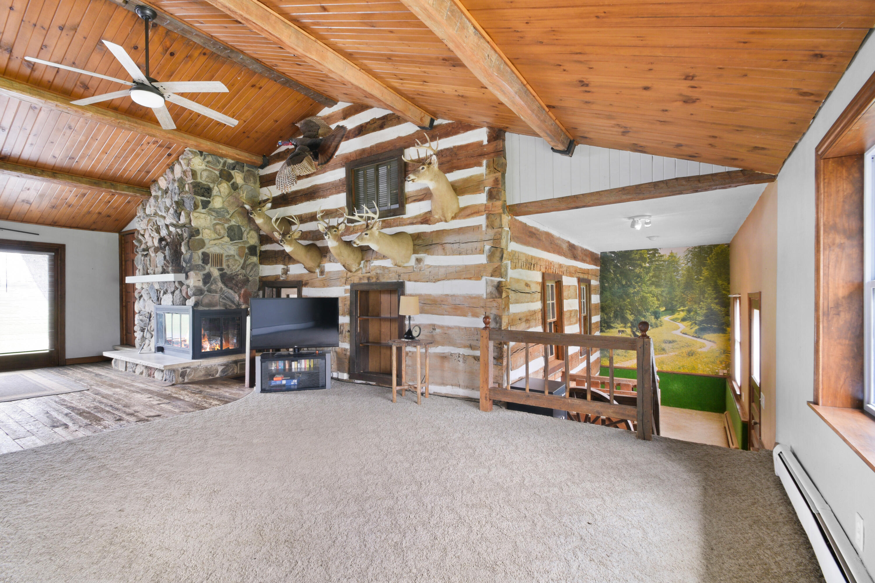 6909 Town Line Road Addison, WI 53090 - Photo 5 of 26 Family room with wood burning fireplace