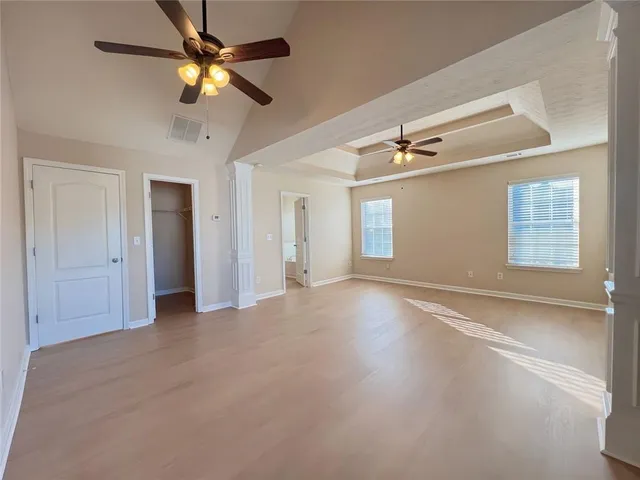 a bathroom with a bathtub and shower