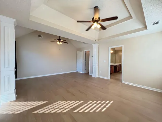 a view of a room that has a window in it