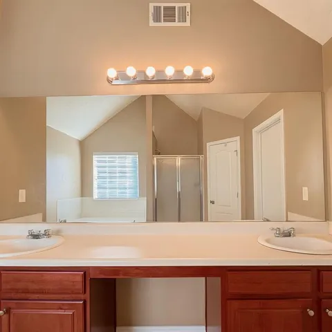 a bathroom with a toilet and a bathtub