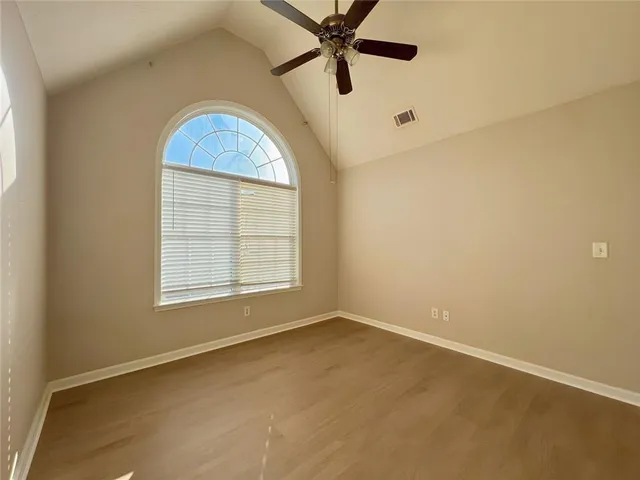 a view of a backyard with a garden and plants