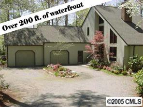 12 Pine Point Road Lake Wylie, SC 29710 - Photo 1 of 8 a front view of a house with a yard