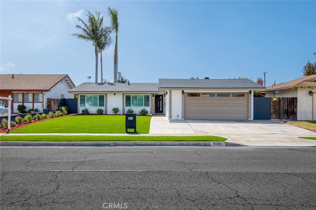 a front view of a house with a swimming pool