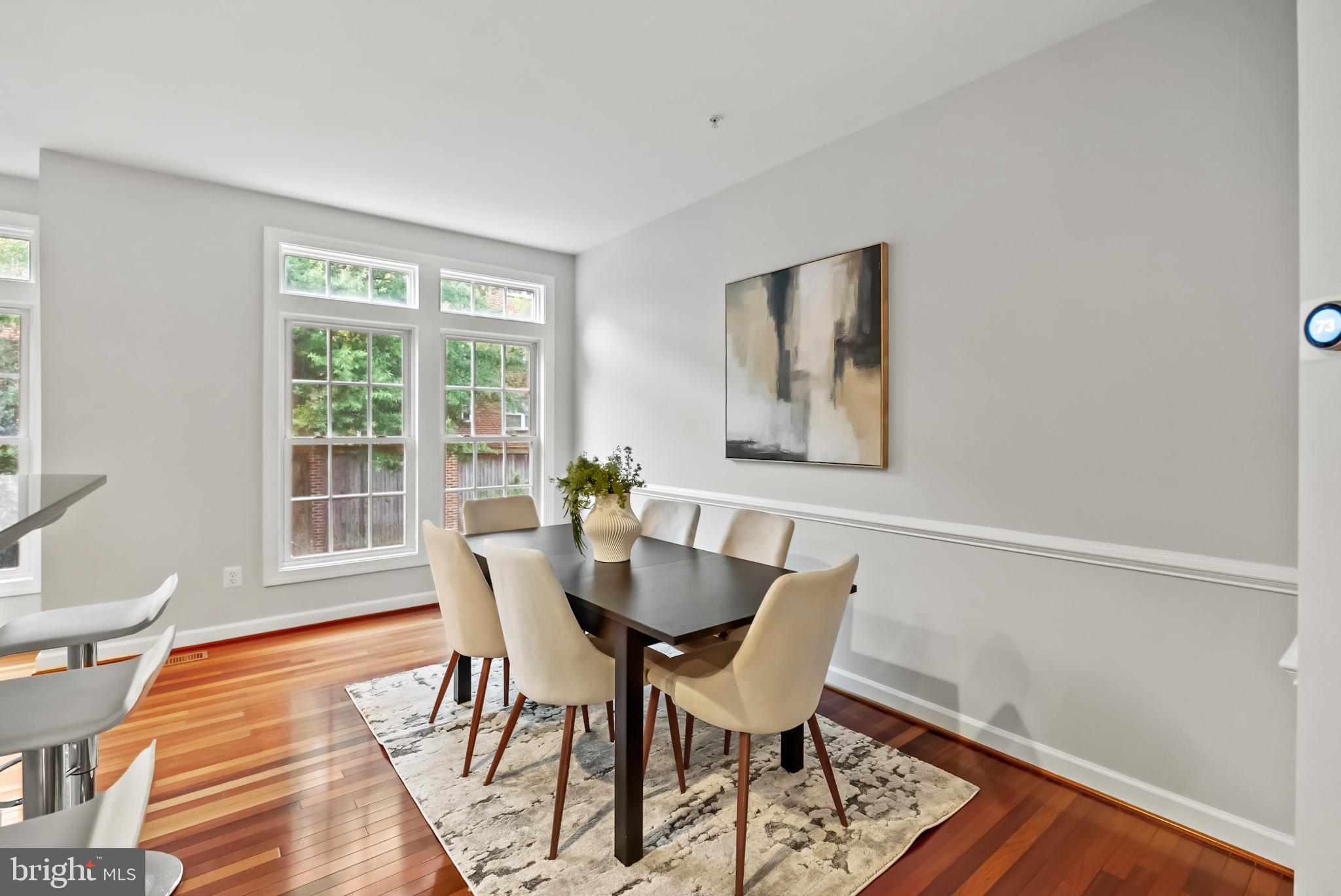 904 West Glebe Road Alexandria, VA 22305 - Photo 14 of 38 a dining room with furniture and wooden floor