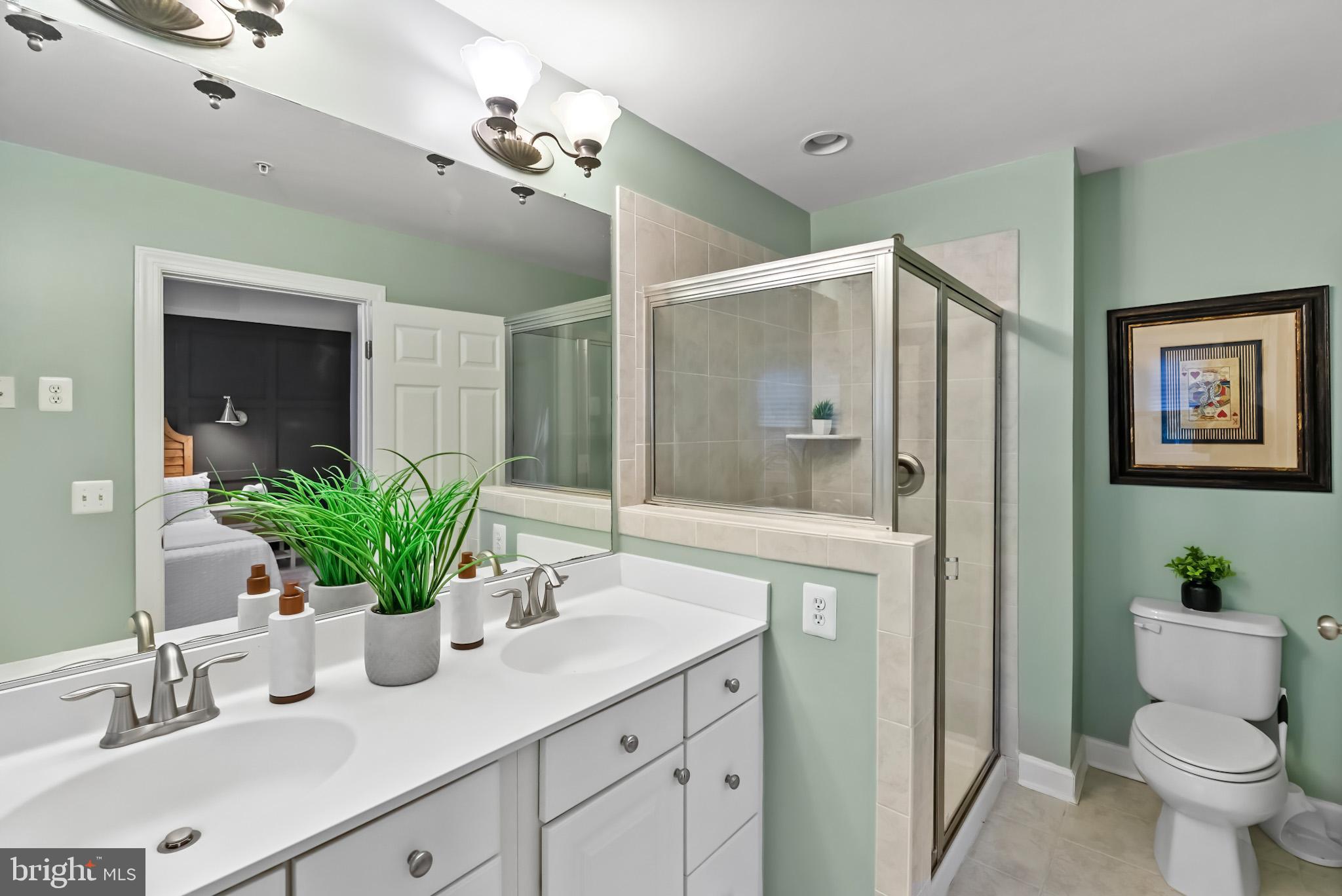 904 West Glebe Road Alexandria, VA 22305 - Photo 23 of 38 a bathroom with a sink a toilet and shower