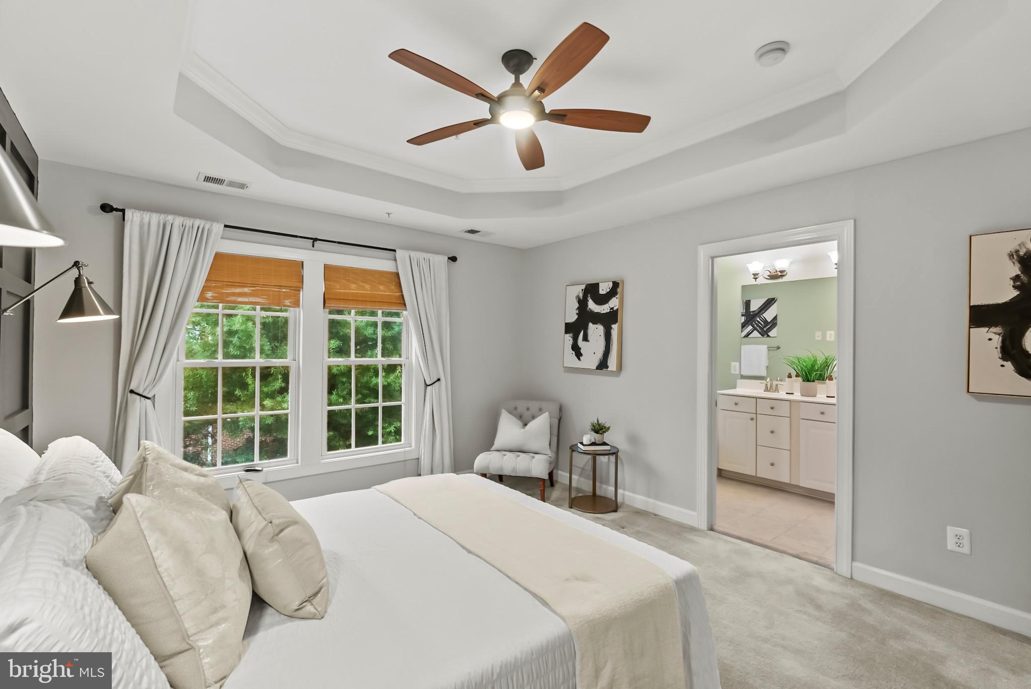 904 West Glebe Road Alexandria, VA 22305 - Photo 29 of 38 a bedroom with a large bed and a large window