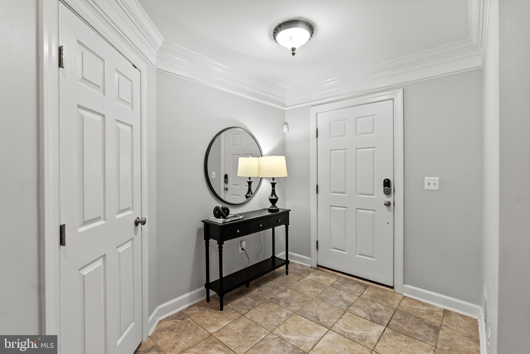 904 West Glebe Road Alexandria, VA 22305 - Photo 31 of 38 a view of a hallway with wooden floor