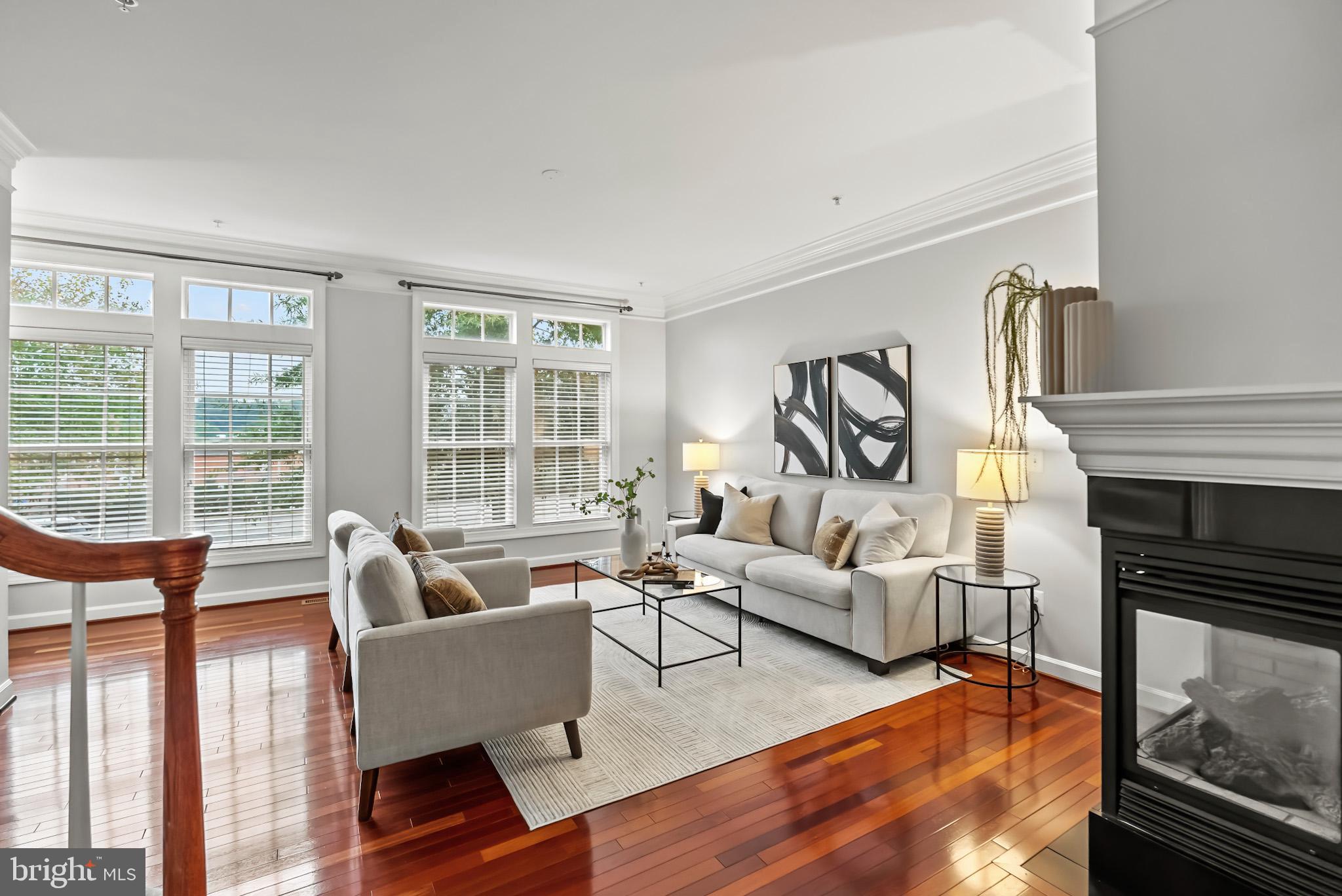 904 West Glebe Road Alexandria, VA 22305 - Photo 32 of 38 a living room with fireplace furniture and a large window
