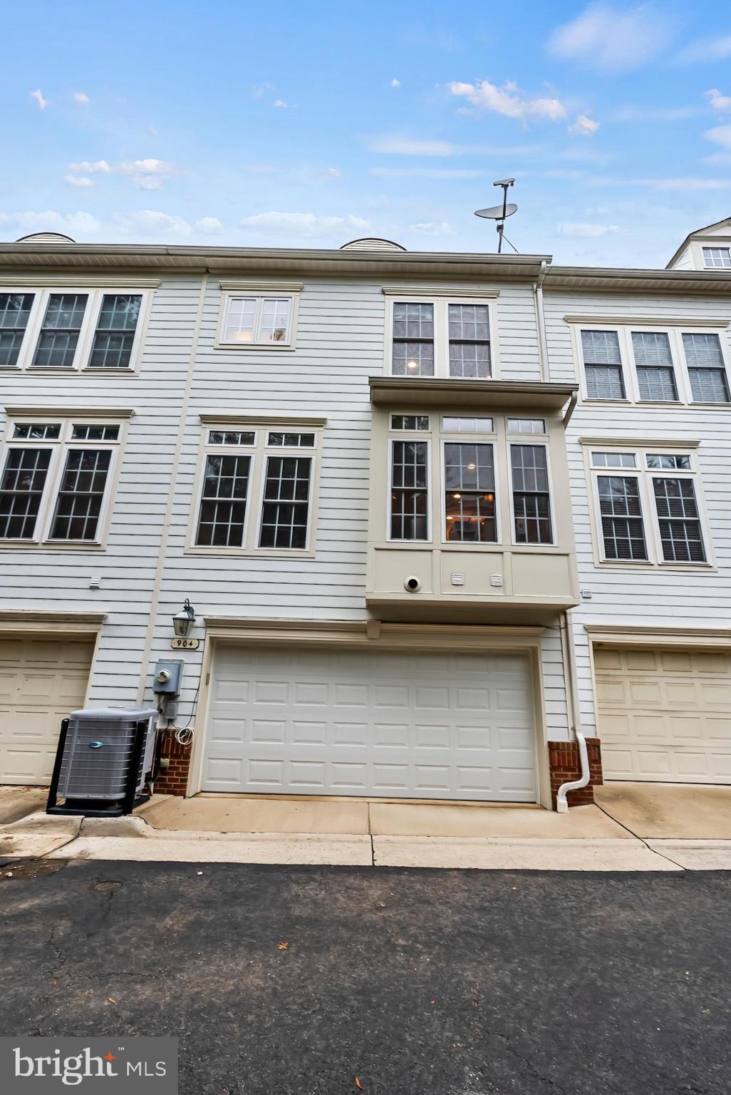 904 West Glebe Road Alexandria, VA 22305 - Photo 34 of 38 a front view of residential houses with parking