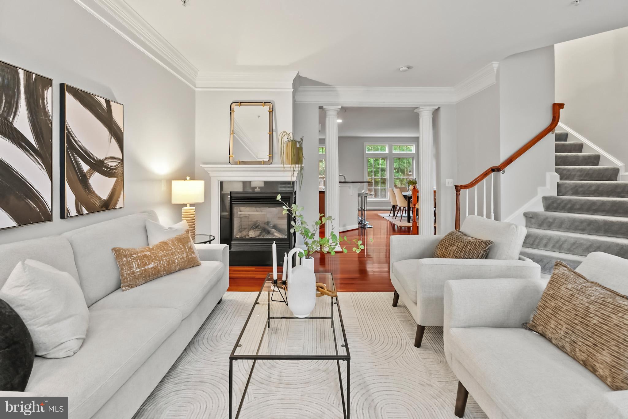 904 West Glebe Road Alexandria, VA 22305 - Photo 8 of 38 a living room with furniture and a fireplace