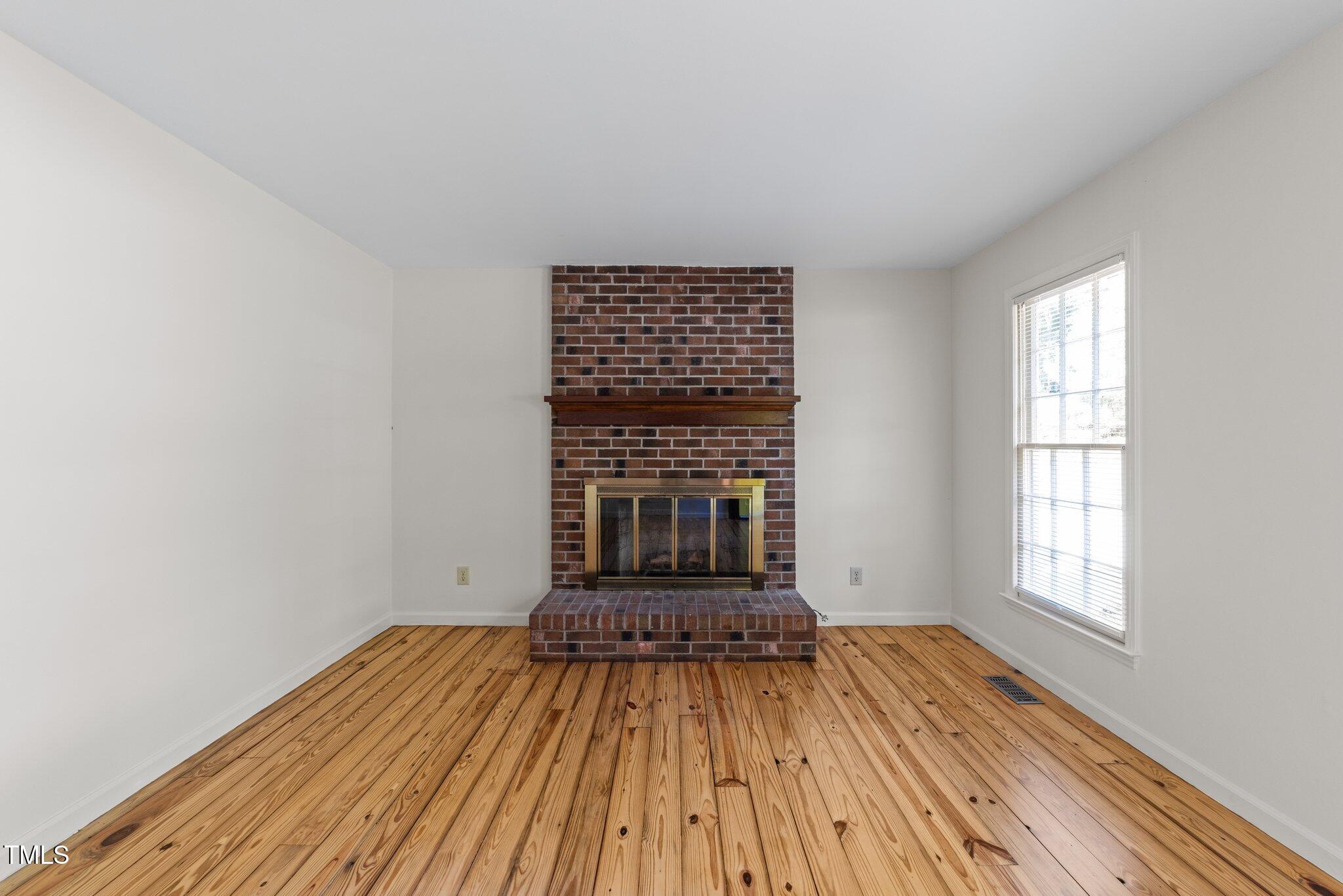 3309 Bearskin Court Raleigh, NC 27606 - Photo 5 of 40 Entry Living Room w/Fireplace