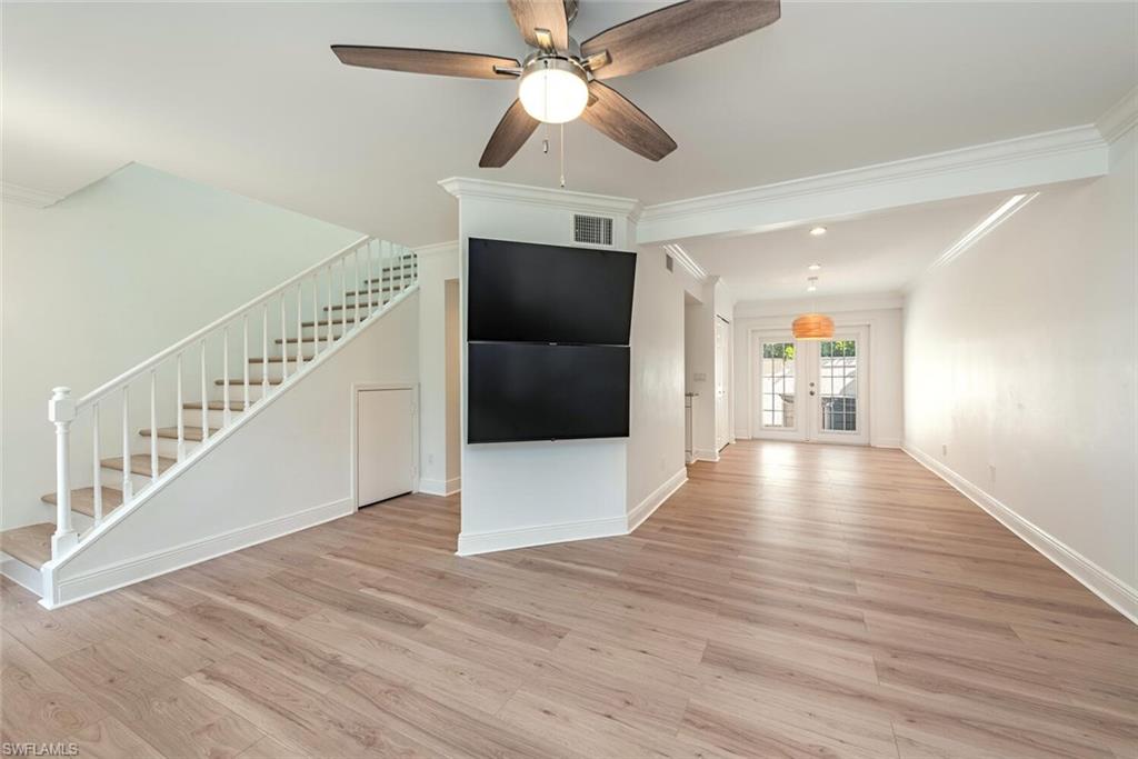 185 4th Street South Naples, FL 34102 - Photo 17 of 22 a view of an entryway with wooden floor