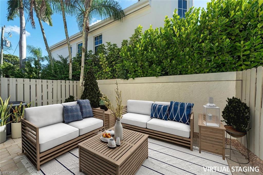185 4th Street South Naples, FL 34102 - Photo 8 of 22 a view of sitting area with furniture