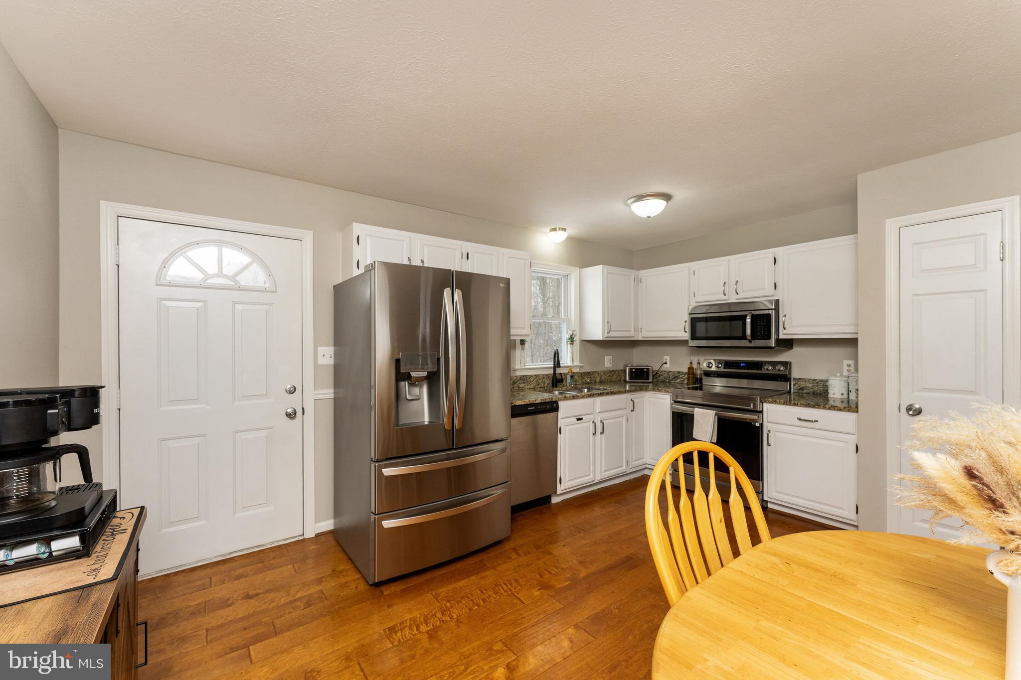 250 Ridge Top Lane Linden, VA 22642 - Photo 11 of 31 Granite Countertops & Recently Painted Cabinets