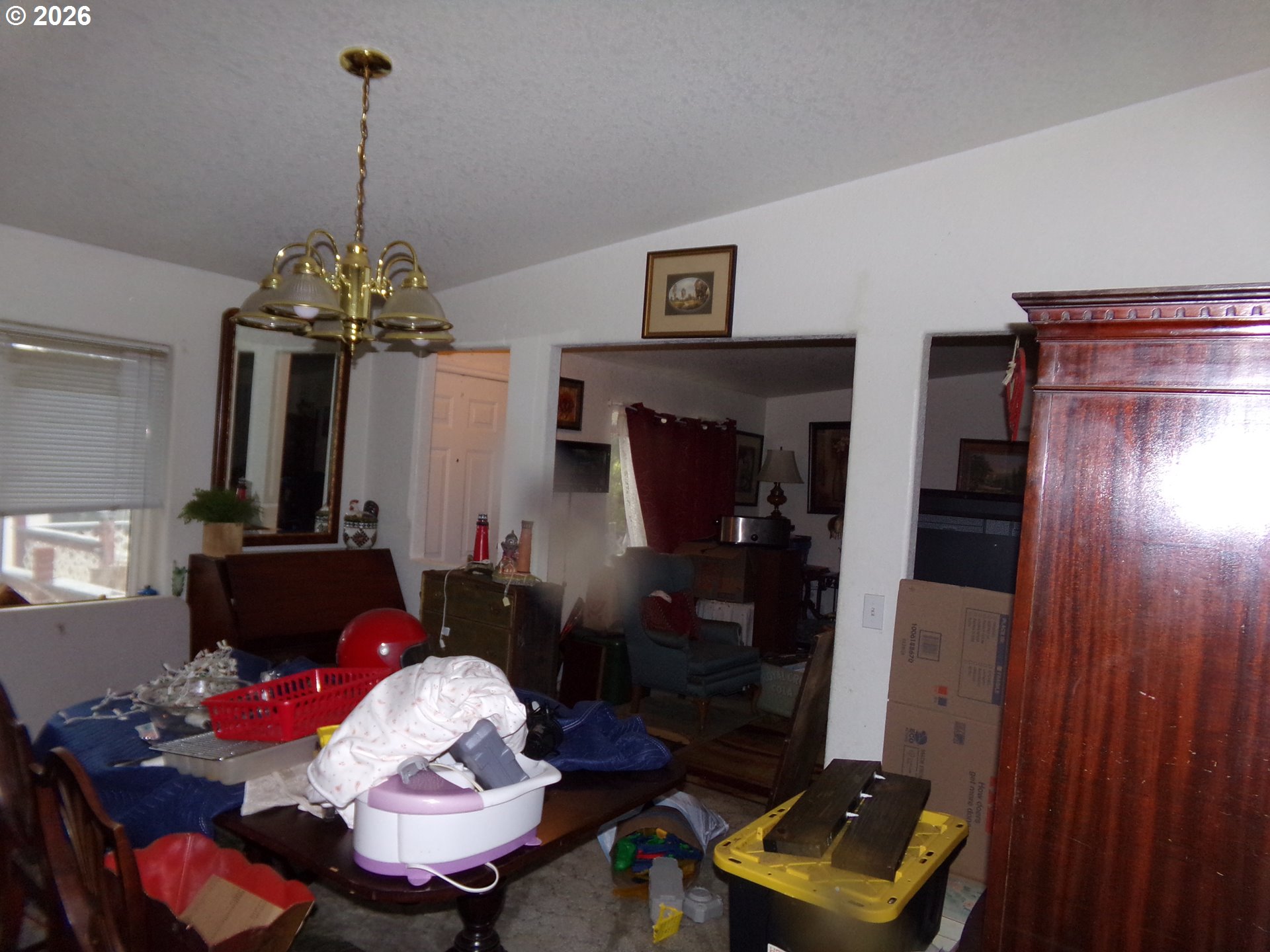 32211 Southeast Proctor Street Gresham, OR 97080 - Photo 21 of 27 a living room with furniture and a chandelier