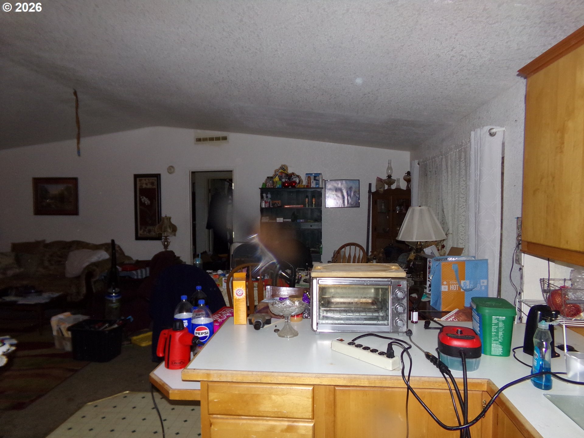 32211 Southeast Proctor Street Gresham, OR 97080 - Photo 22 of 27 a living room with furniture and a flat screen tv
