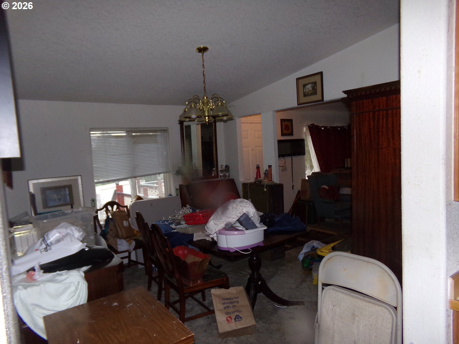 32211 Southeast Proctor Street Gresham, OR 97080 - Photo 23 of 27 a living room with furniture and a chandelier