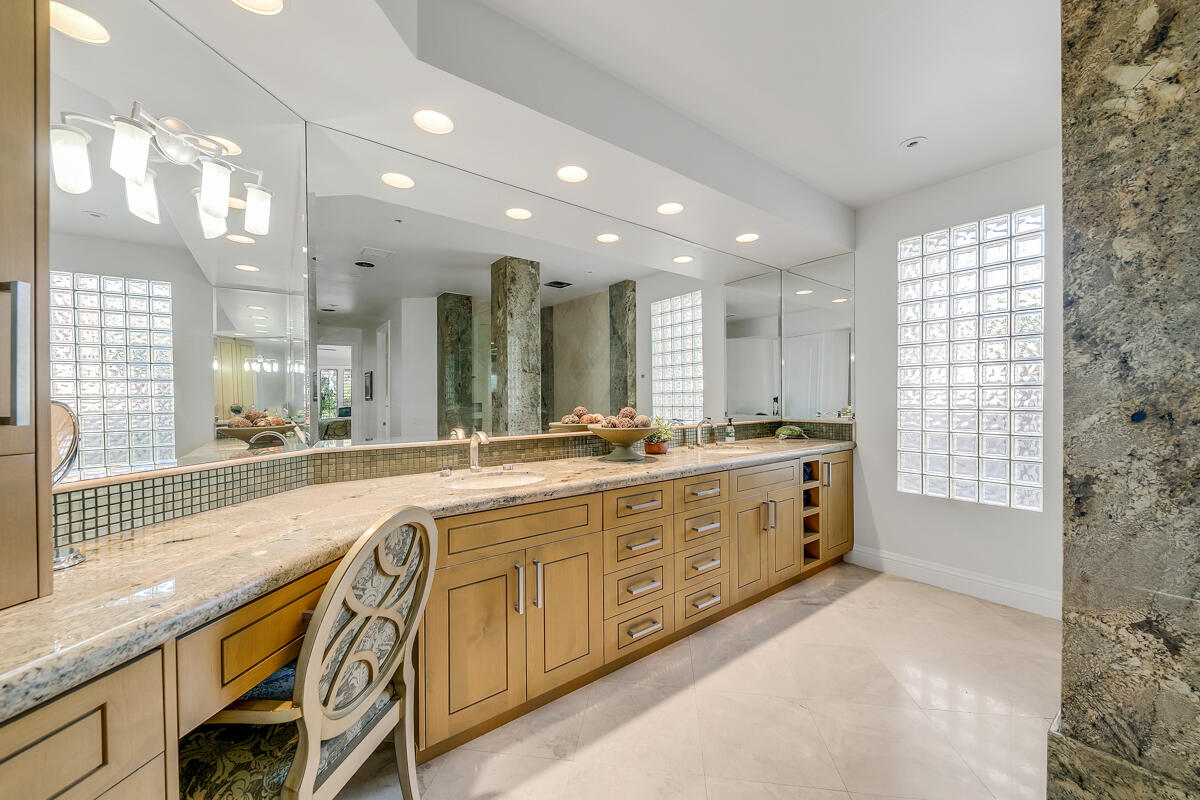 54310 Riviera La Quinta, CA 92253 - Photo 26 of 45 a large bathroom with a large tub and sink