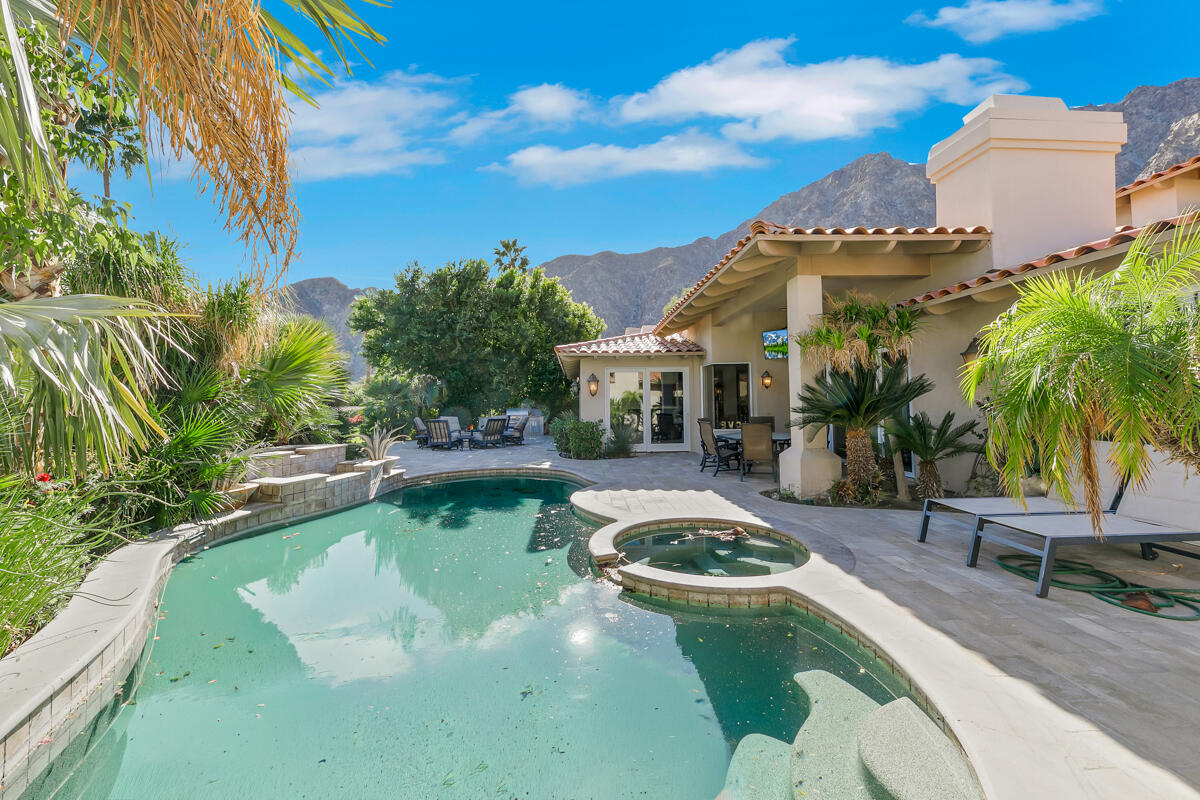 54310 Riviera La Quinta, CA 92253 - Photo 43 of 45 a view of a swimming pool with a patio