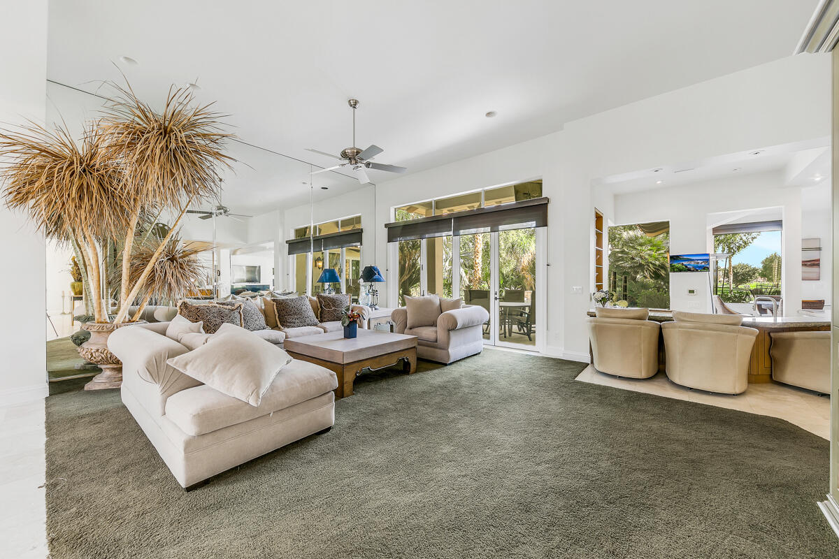 54310 Riviera La Quinta, CA 92253 - Photo 7 of 45 a living room with furniture and a large window