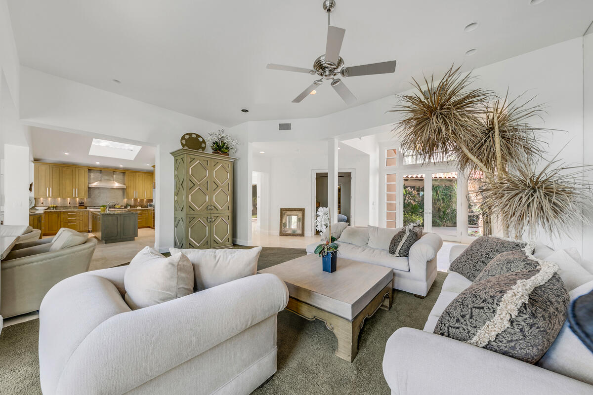 54310 Riviera La Quinta, CA 92253 - Photo 8 of 45 a living room with furniture and a large window