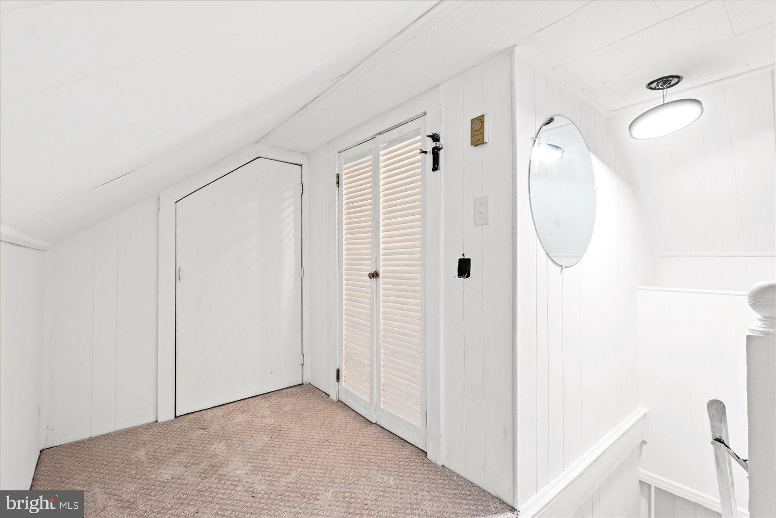 92 Front Street Warsaw, VA 22572 - Photo 38 of 85 Attic Walk-in Closet