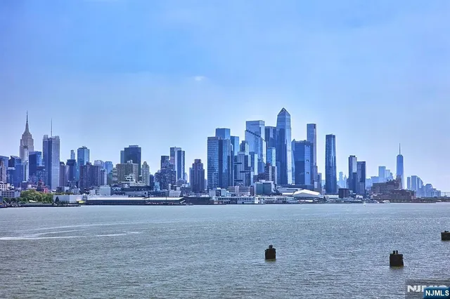 a view of a city with tall buildings