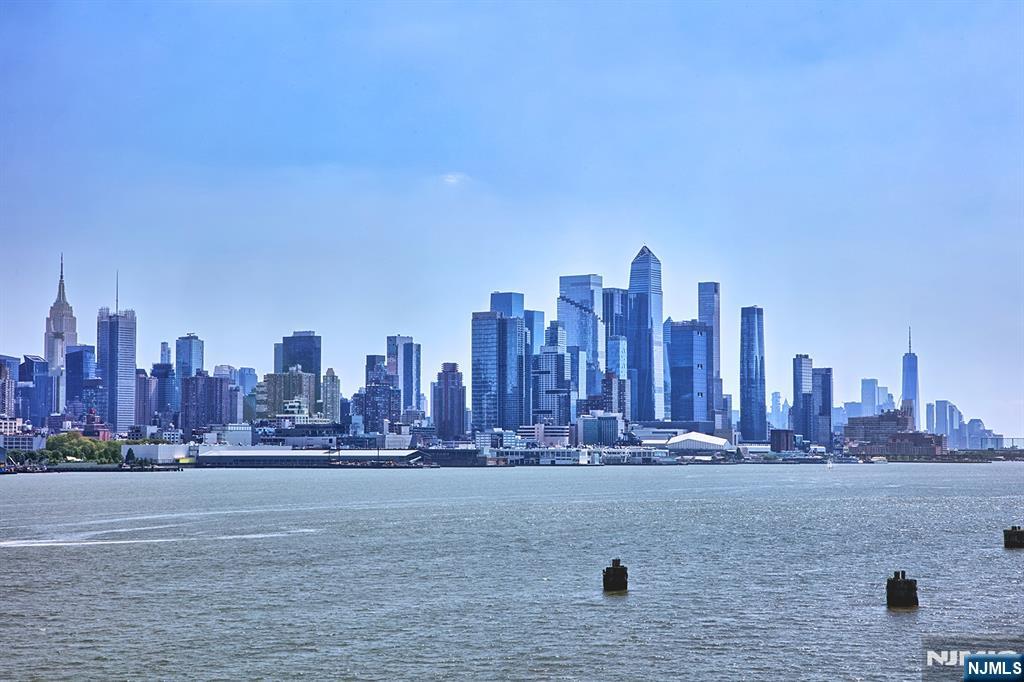 a view of a city with tall buildings