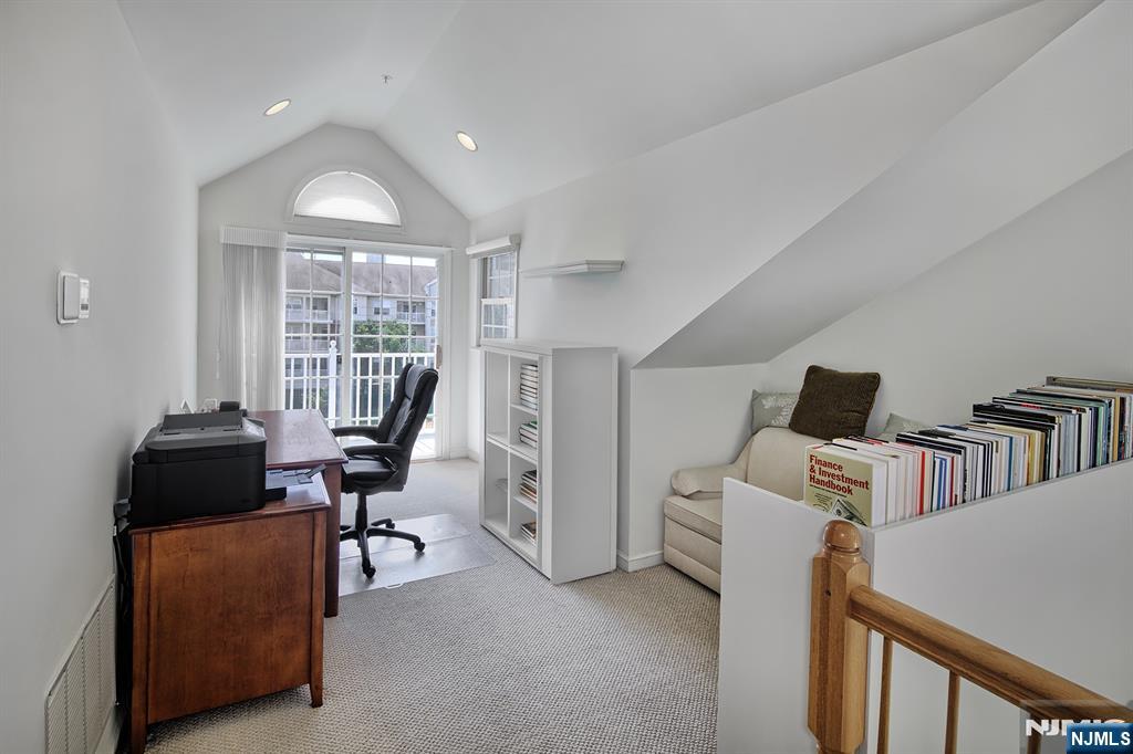 406 Newburgh Court West New York, NJ 07093 - Photo 12 of 31 a workspace with furniture and a window