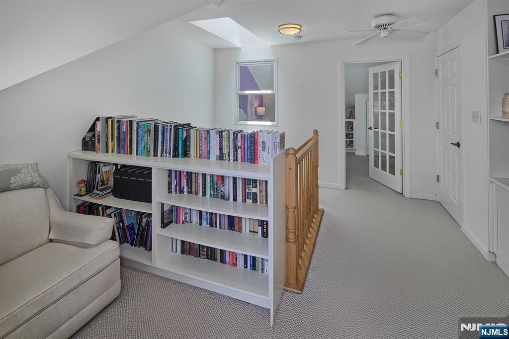 406 Newburgh Court West New York, NJ 07093 - Photo 14 of 31 a living room with furniture and baby crib
