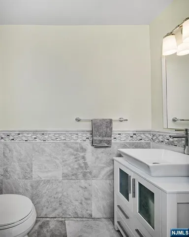 a bathroom with a sink and a toilet