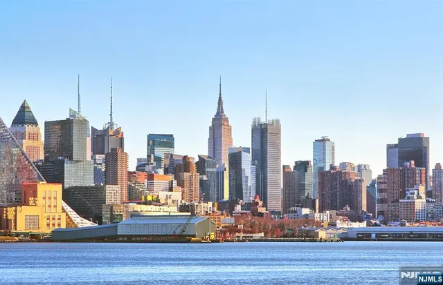 a view of a city with tall buildings
