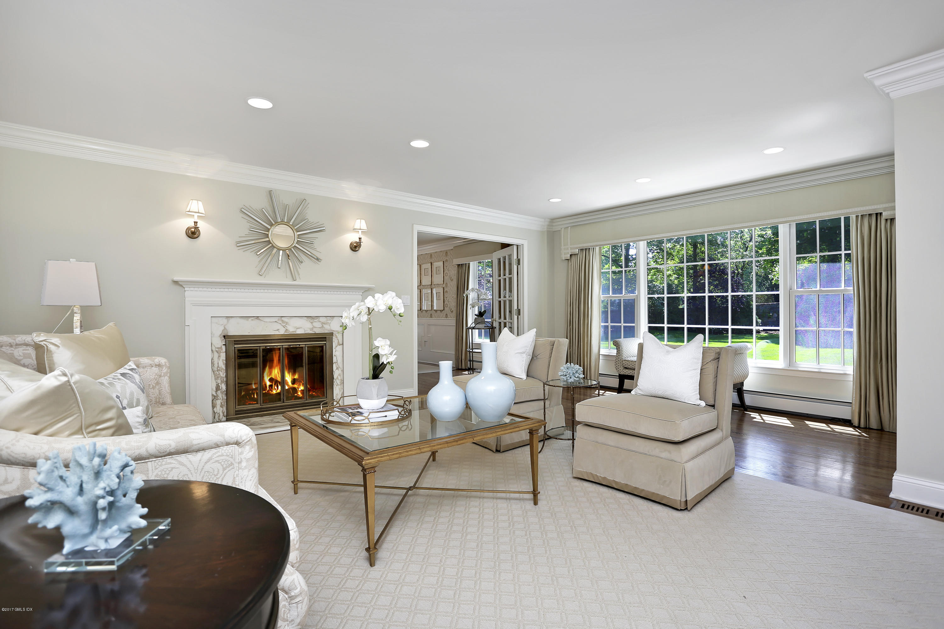 111 Stanwich Road Greenwich, CT 06830 - Photo 5 of 24 a living room with furniture and a fireplace