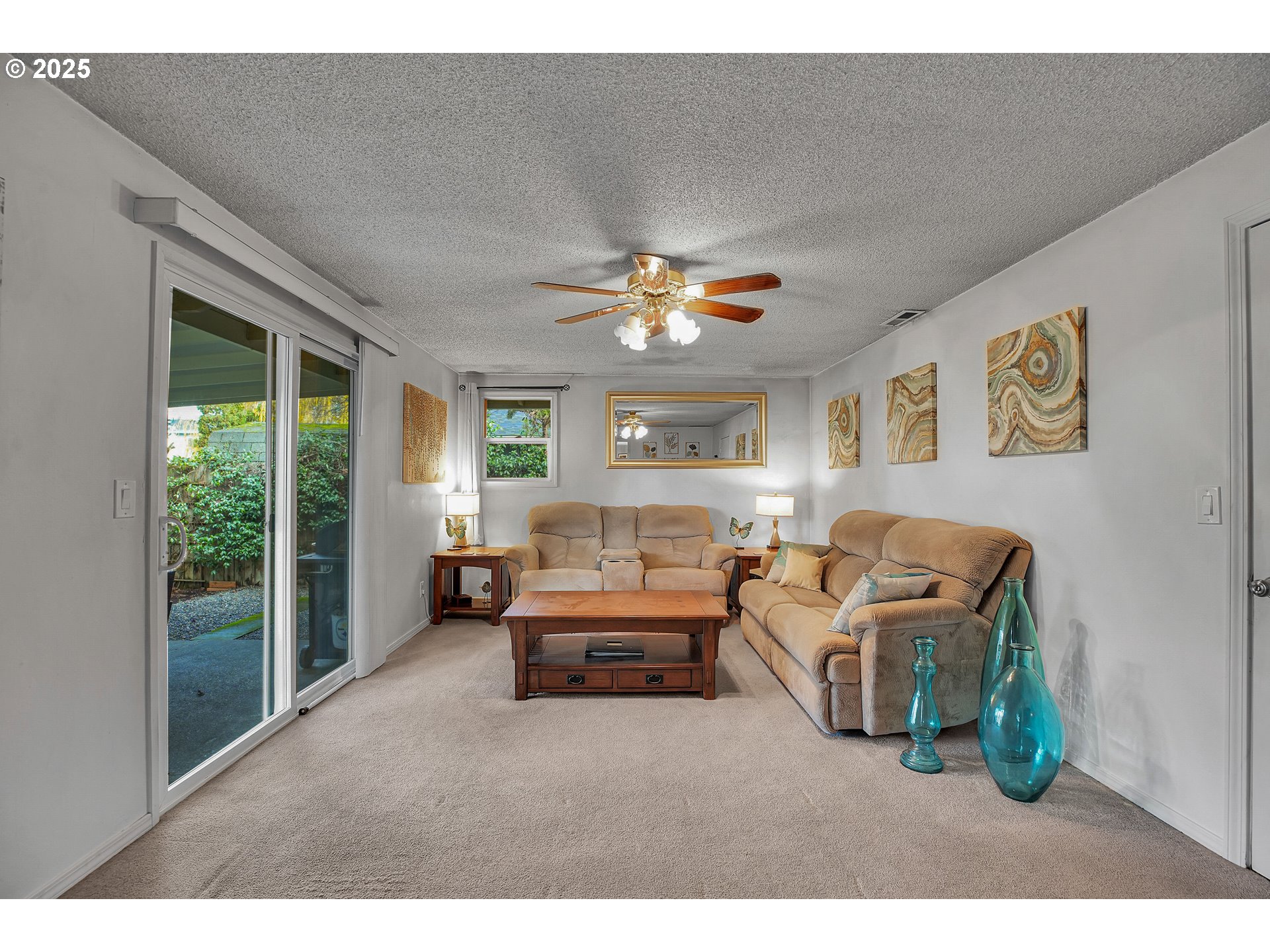 17277 Southwest Sugar Plum Court Beaverton, OR 97007 - Photo 12 of 31 a living room with furniture and a large window