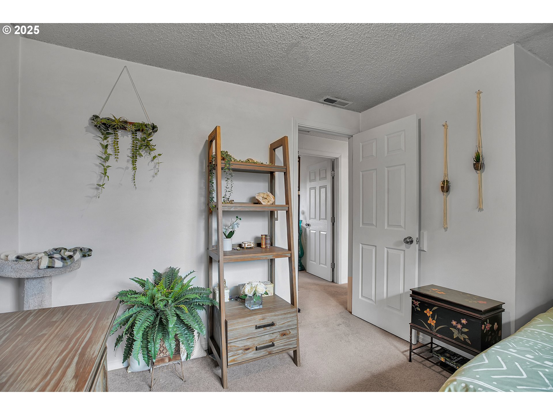 17277 Southwest Sugar Plum Court Beaverton, OR 97007 - Photo 19 of 31 a living room with furniture and wooden floor