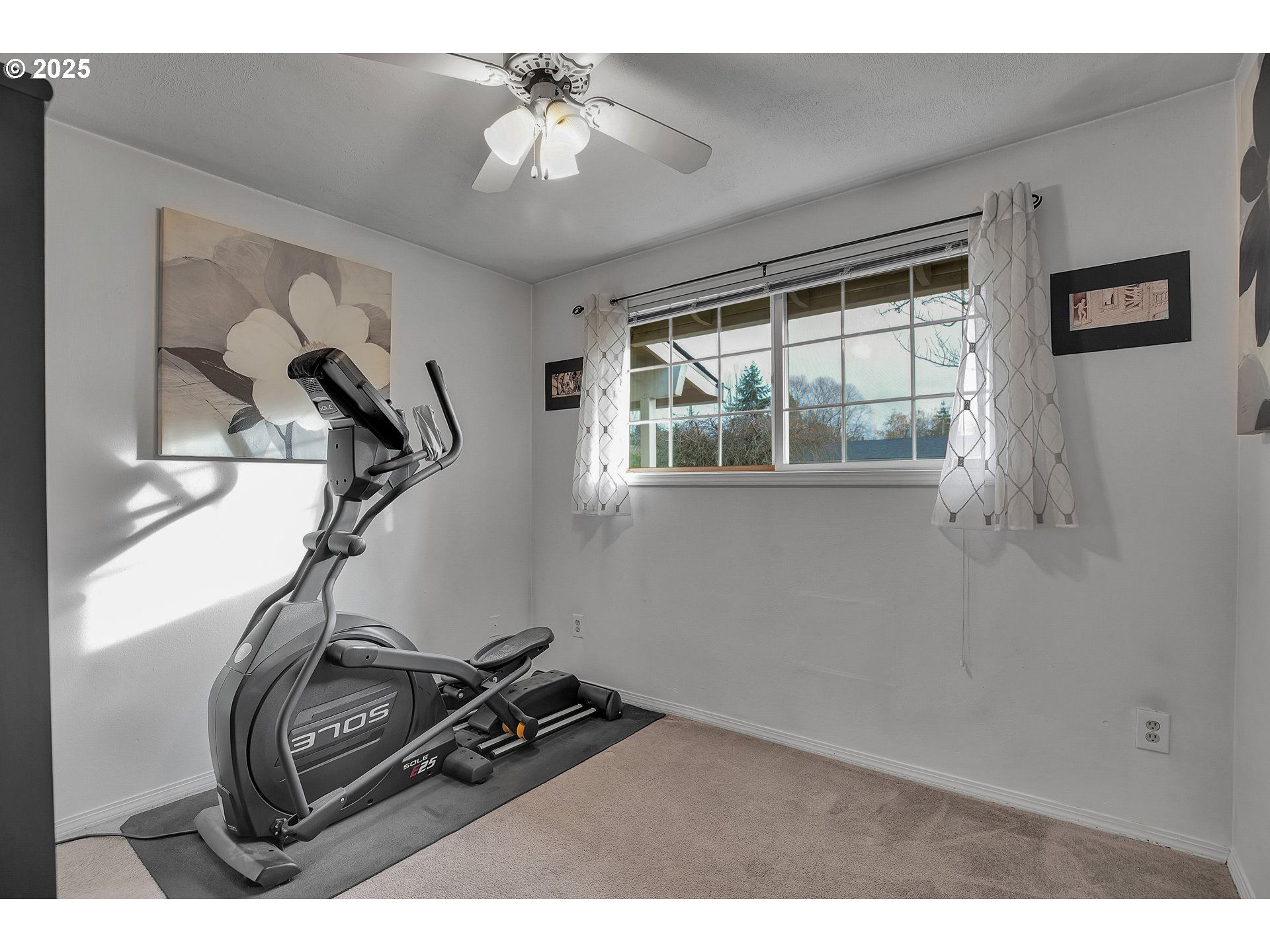 17277 Southwest Sugar Plum Court Beaverton, OR 97007 - Photo 20 of 31 a view of a room with gym equipment