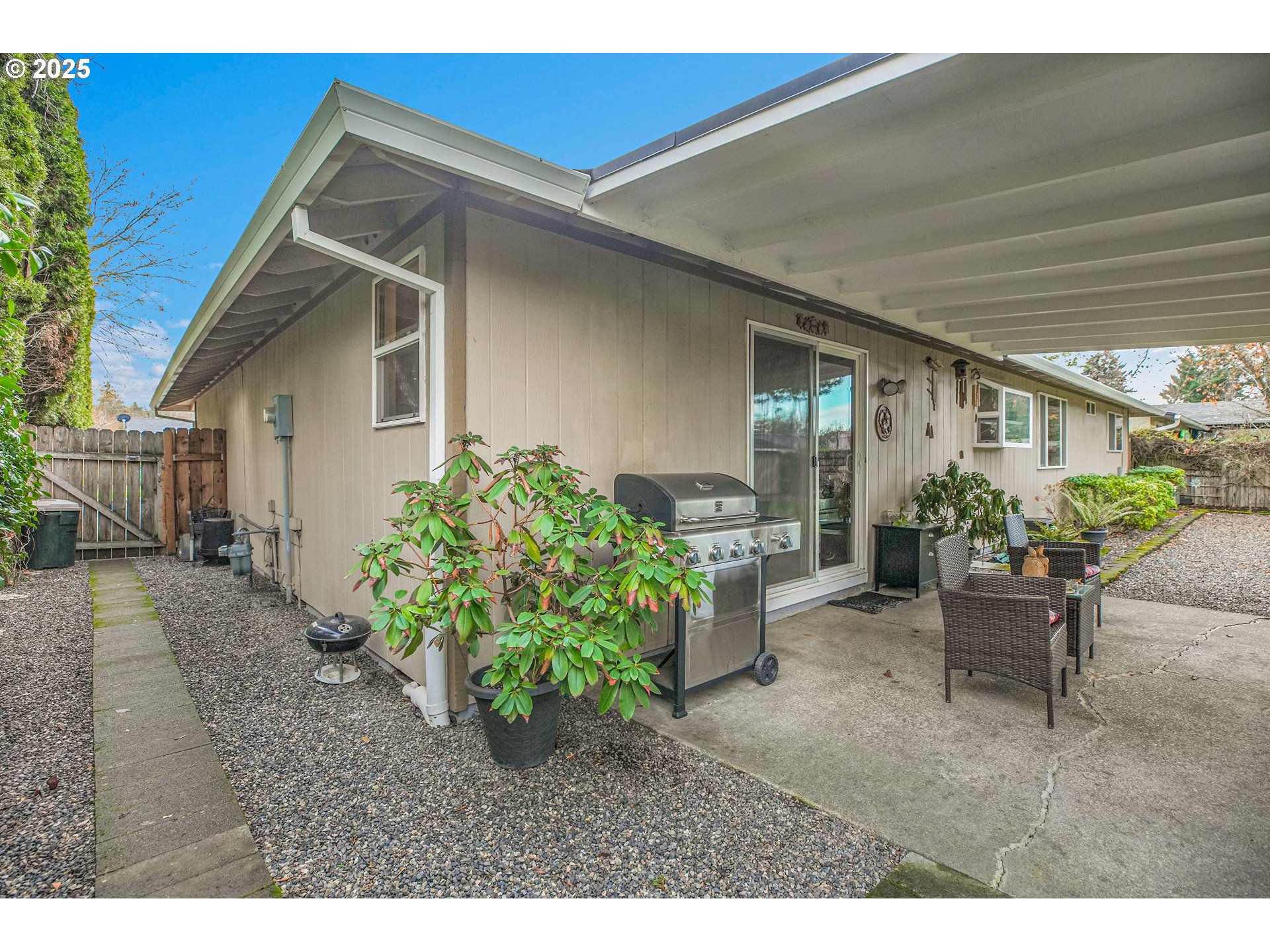 17277 Southwest Sugar Plum Court Beaverton, OR 97007 - Photo 25 of 31 a backyard of a house with outdoor seating