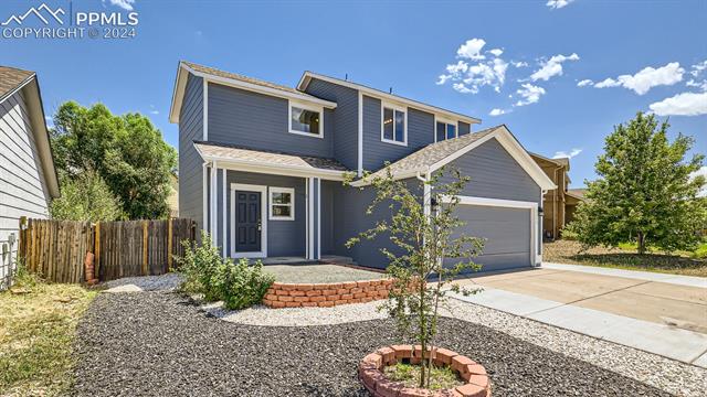 2053 Jeanette Way Colorado Springs, CO 80951 - Photo 2 of 33 Xeriscaped front