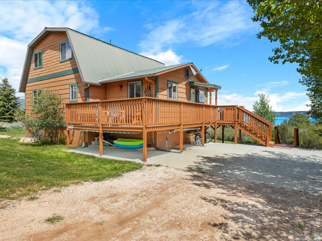 371 Lewis Loop, Unit 29 Fish Haven, ID 83287 - Photo 14 of 40 Rustic style residence featuring a prominent wood deck and a metal roof