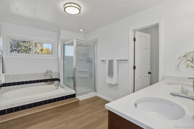 a bathroom with a sink and a large mirror