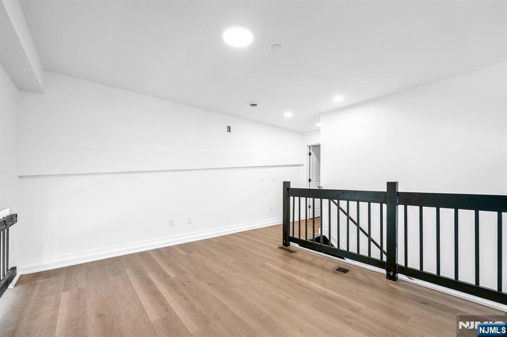 315 Railroad Avenue, Unit 107 East Rutherford, NJ 07073 - Photo 15 of 25 a view of a hallway