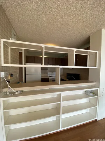 an empty room with a workbench