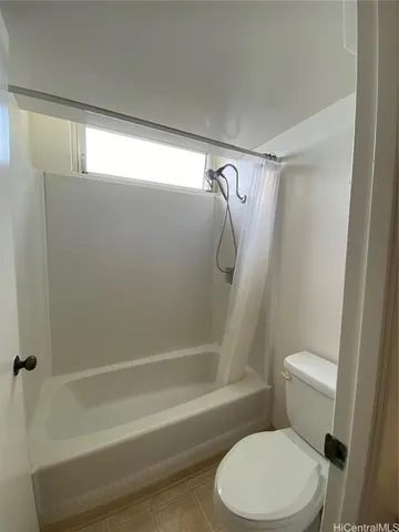 an empty room with mirror