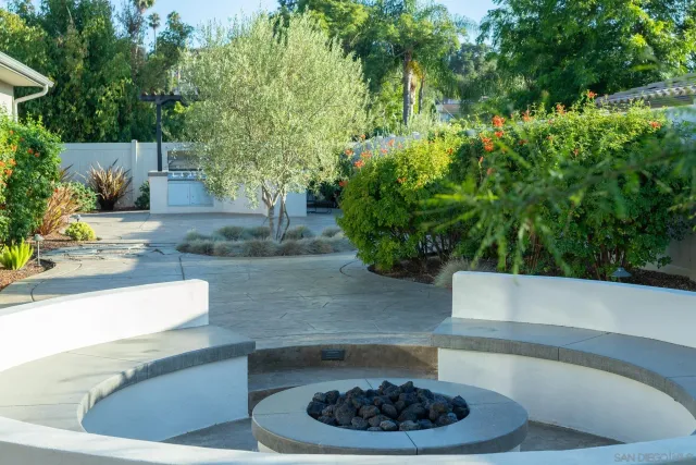 a view of a back yard of a house