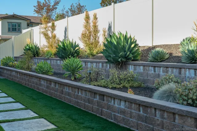 a view of a house with a tree