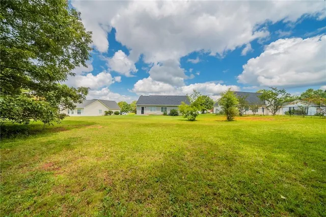 a view of an ocean yard and outdoor seating