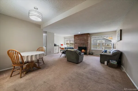 a bedroom with furniture and a chandelier