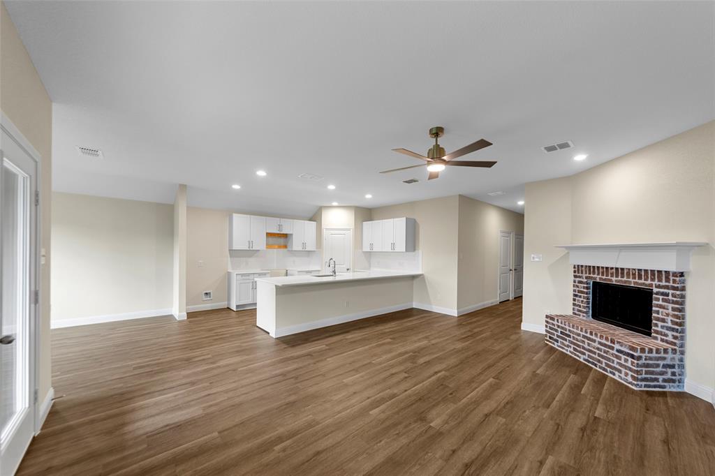 200 Pennington Road Josephine, TX 75173 - Photo 5 of 22 Open-concept living space featuring wood-finish flooring, recessed lighting, and a ceiling fan
