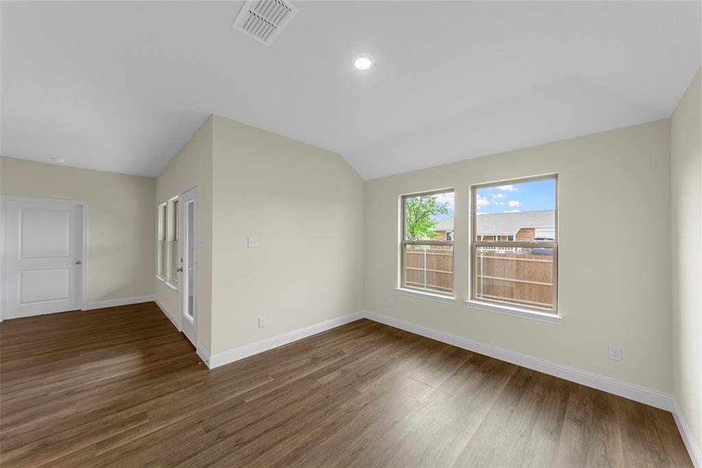 200 Pennington Road Josephine, TX 75173 - Photo 6 of 22 Spacious room featuring wood-finish flooring, light-toned walls, and recessed lighting