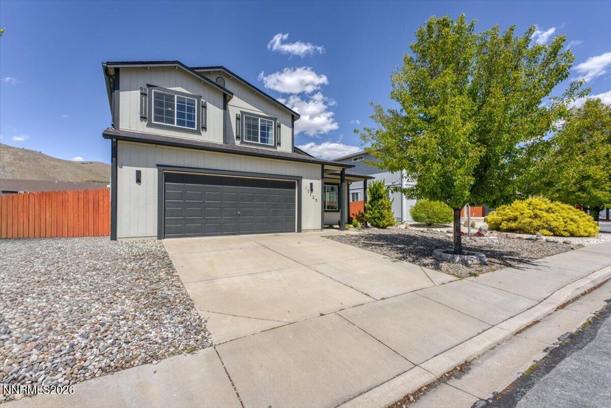 17725 Gingko Court Reno, NV 89508 - Photo 1 of 37 a front view of a house with garden